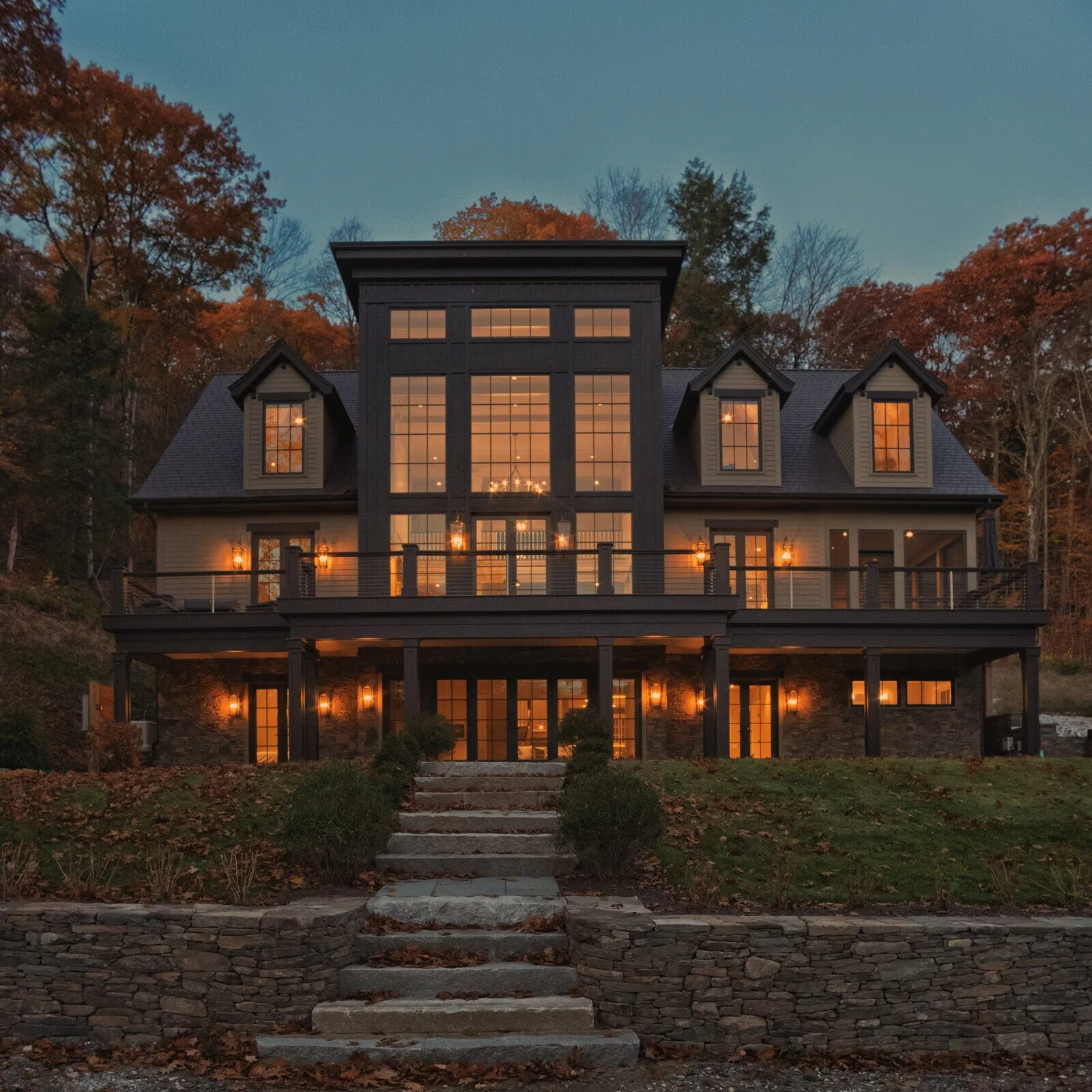 The Lakehouse — finished lake-facing exterior at dusk