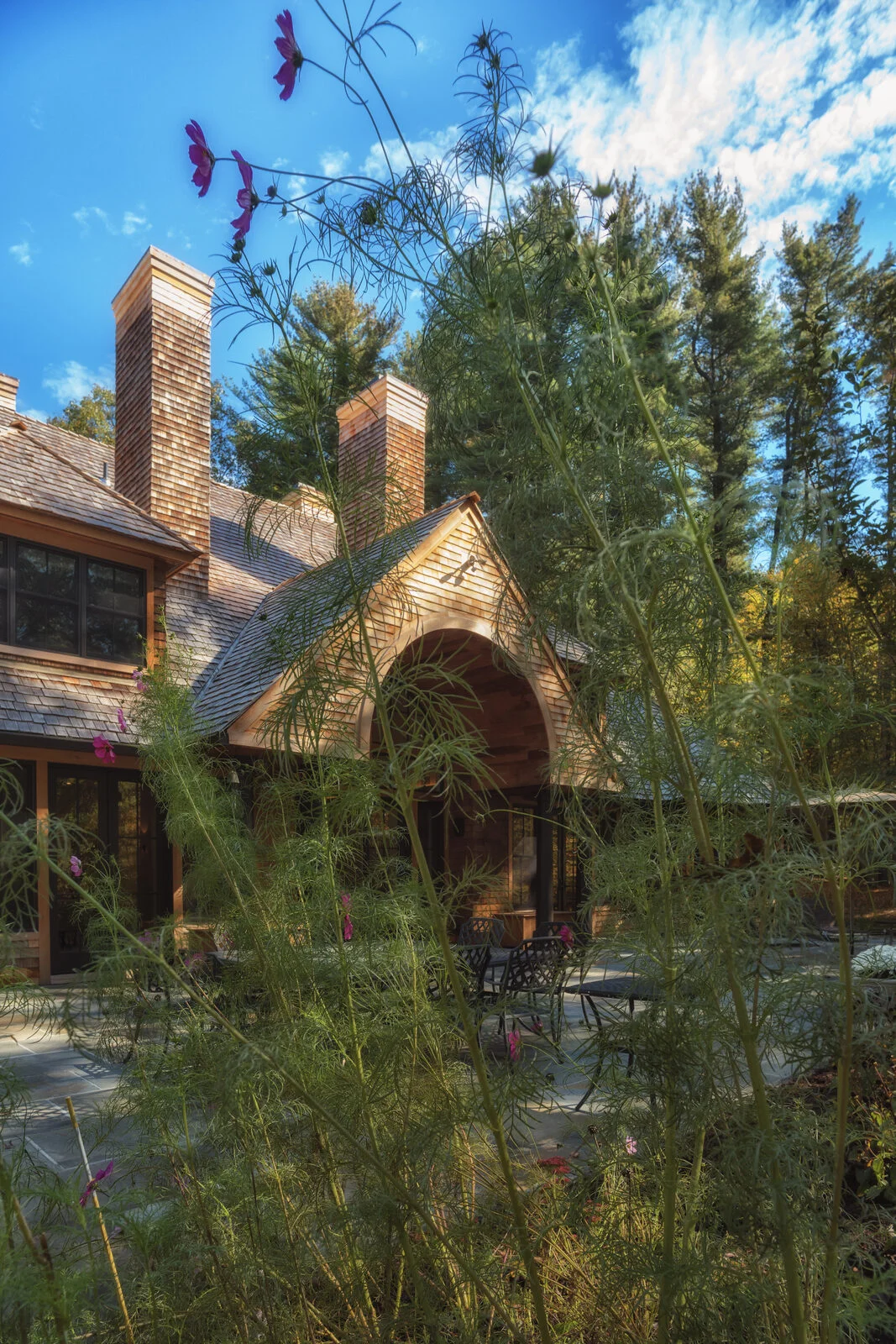 Rear garden with wildflowers and bluestone patio