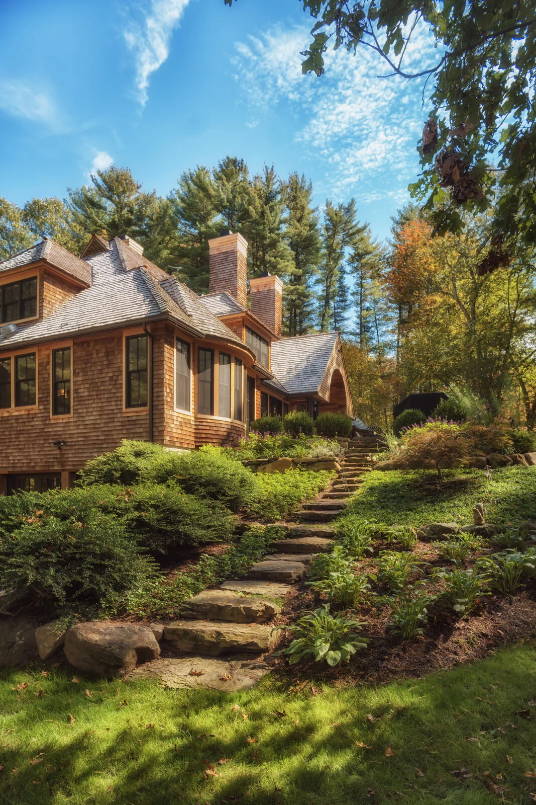 Rear hillside with stone steps through terraced gardens